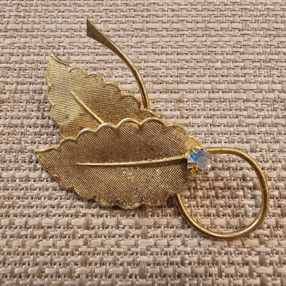 Vintage West Germany Mid Century goldtone leaf brooch w/ Aurora Borealis Stones
